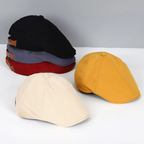 Unisex flat cap with curved flap and textured top